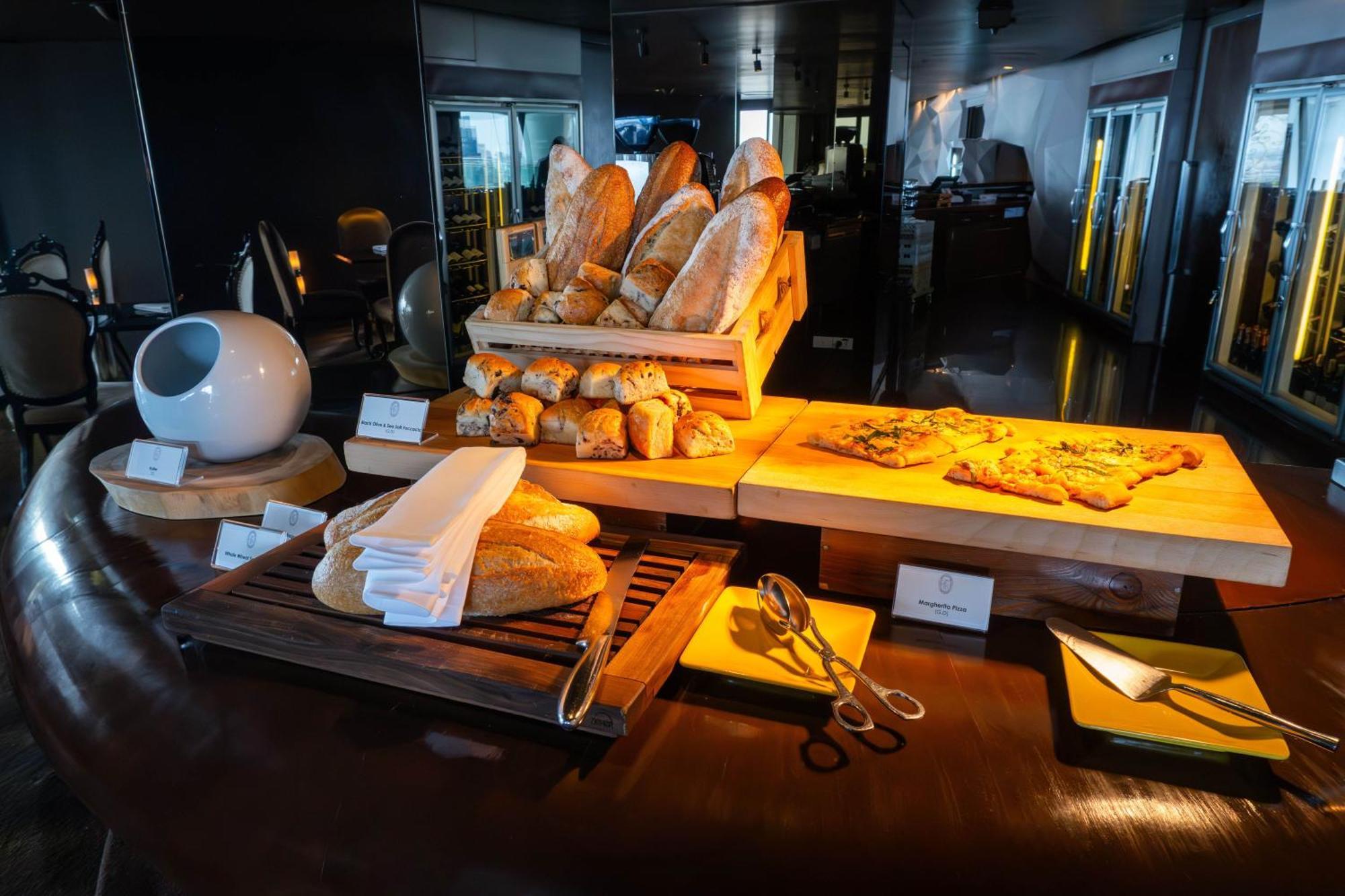 Lebua At State Tower Hotel Банкок Екстериор снимка Bread and pastry selection at a buffet